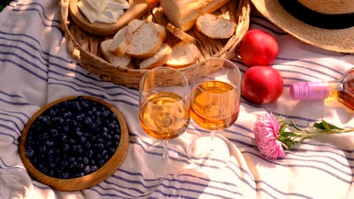 Summertime Picnic with Food and Drinks in Nature