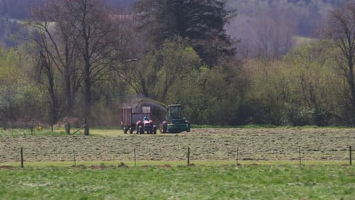 Oregon Circa-2020. Stabilized Driving Shot Of Tractor In Field. Shot With Cineflex Gimbal And Red...