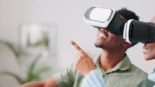 Couple Experiencing Virtual Reality with Headsets
