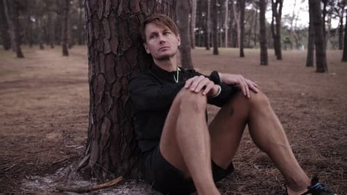 Thirsty Sad Lonely Depressed Man against Tree