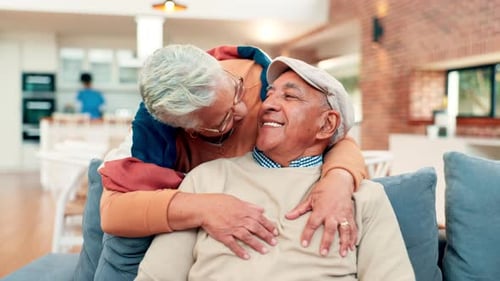 Senior Couple Embracing Affectionately in Modern Home