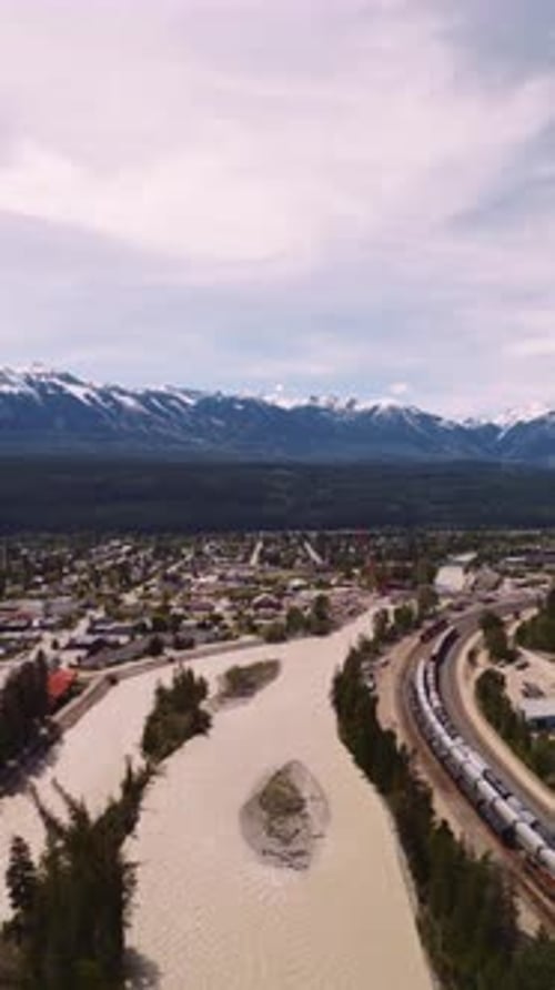 Drone moving forward showing Golden, BC - vertical