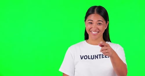 Green screen, volunteer and a woman pointing at you for advertising, charity or accountability