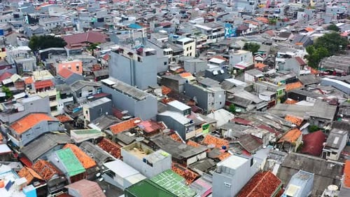 aerial of dense population living together in Jakarta Indonesia during day