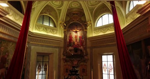 Lodi, Italy - 12 May 2018: Aerial view with drone inside a Christian church. Inside you can see cr