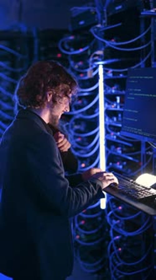 IT Team Working on Servers in a Data Center