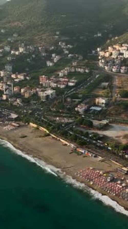 Vertical Video Aerial View of the Evening Beach Sea Texture in the Mediterranean Sea