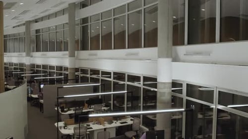 modern empty office, top view slow flight over workplaces