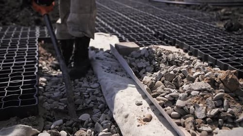 Builder Works with a Shovel
