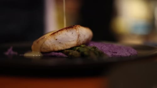 Close-Up of Fish Dish with Purple Vegetables