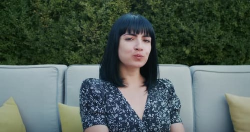 a Cheerful Woman Enjoys Food in a Restaurant She Eats It with Pleasure and Fills Her with Joy