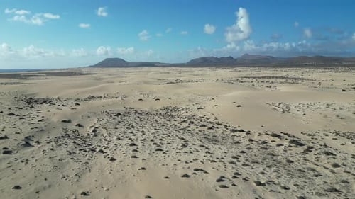 Aerial view of desert dunes and mountains, Spain.