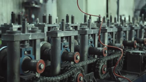 Industrial metalworking machine operating in a factory