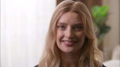 Woman Smiling in a Close Up Portrait