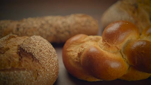 Delicious Bread Close Up On Wood Surface