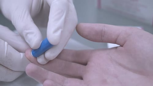 Blood Sample Taken with Finger Prick Device
