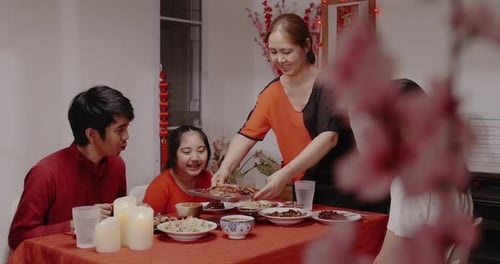 Loving Family Celebrates with Festive Meal at Home