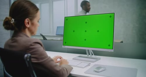 Professional Female Financial Expert Enters Data Using Computer with Green Screen Chroma Key