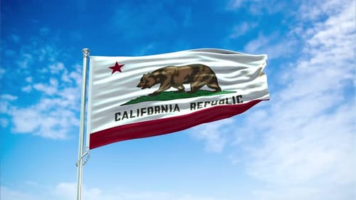 California State Flag Waving Against Blue Sky