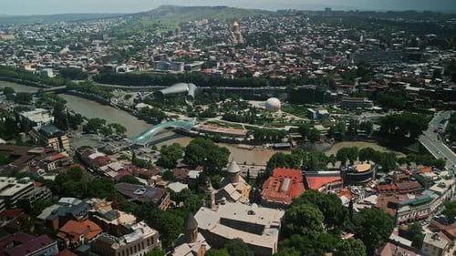 Aerial View of Central Tbilisi with Bridge of Peace and Holy Trinity Cathedral