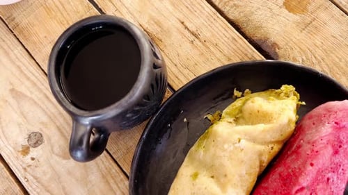 Tamales and Coffee on Rustic Wooden Table