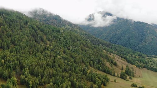 Hills and Mountains with Dense Forest Stunning Natural Landscape Aerial Drone Shot