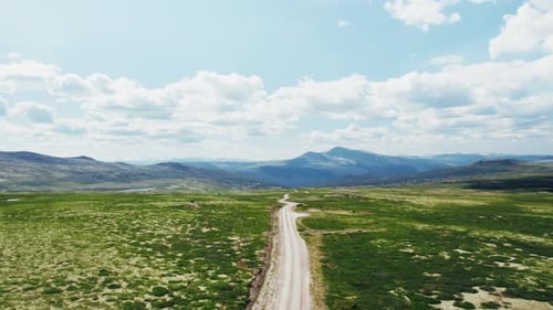 Aerial of Camper Van Drive Off Road on Mountain