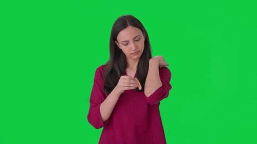 Indian woman putting a bandage Green screen