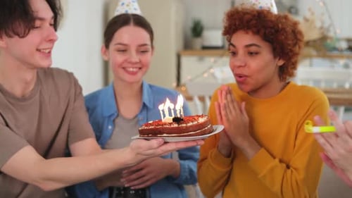 Friends Celebrating Birthday Together at Home