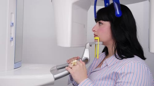 Woman Undergoing Panoramic Dental x Ray Scan
