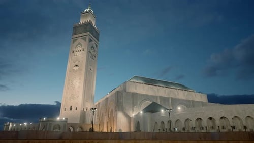 Beautiful Square with Mosque and Minaret on Sunset Sky Background