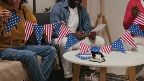 Family Making American Flag Bunting for Fourth of July