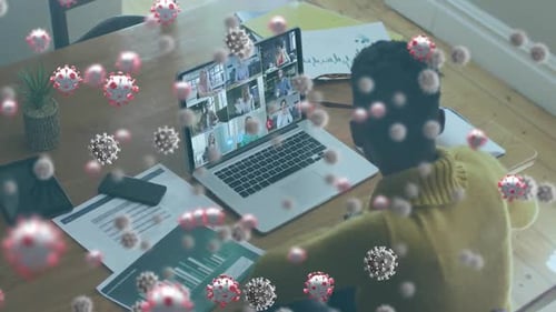 Animation of covid 19 cells over woman using laptop on video call