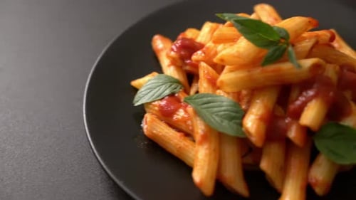 Penne pasta in tomato sauce - Italian food style