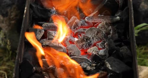 Closeup of flaming charcoal in the brazier