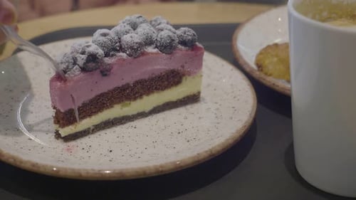 Close Up of Delicious Blueberry Cake Being Eaten