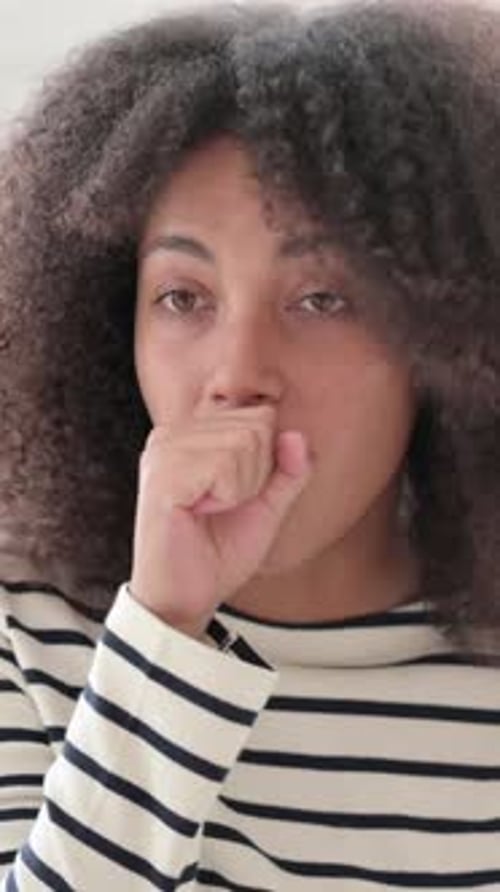 Allergic African Woman Coughing, Sick, vertical video