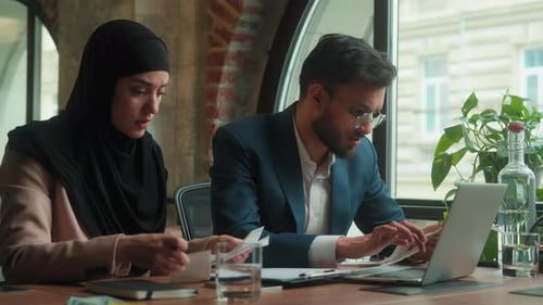 Business Partners Arabian Indian Man Muslim Hijab Woman Office Colleagues Count Bills Calculate Pay