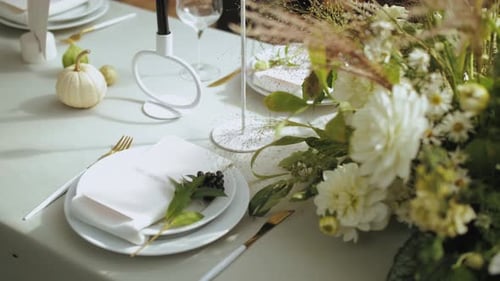 Elegant Wedding Table Setting With White Flowers