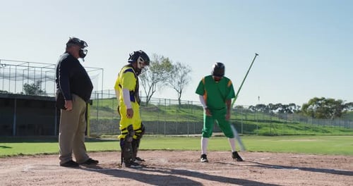 Upon dropping bat at home plate batter pivoting sprinting toward first base evading tag, copy space