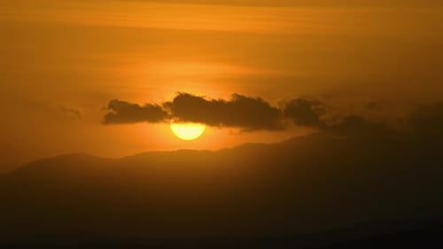 Sun Sets In The Mountains