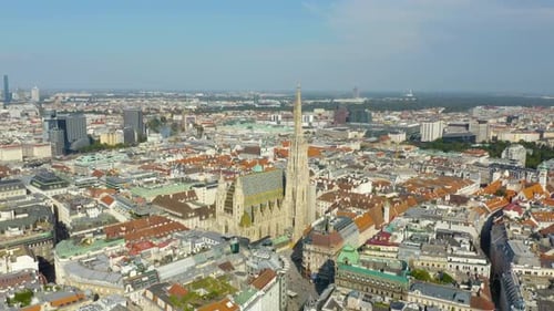 Aerial Pullback Away from St. Stephen's Cathedral, Vienna, Austria. Establishing Shot