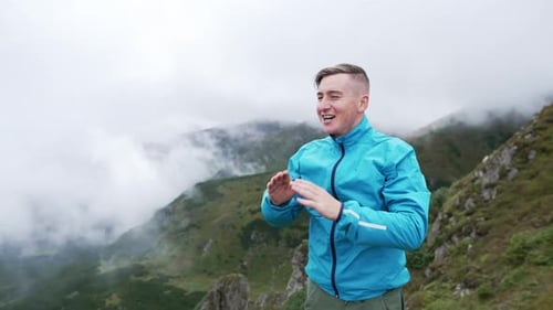 The Victorious Tourist Won By Conquering the Top of the Mountain