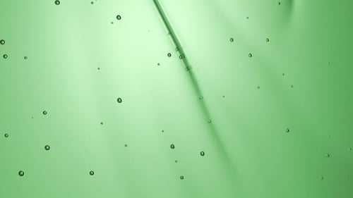 Aloe Vera Gel Flow Texture Clear Green Cosmetic Cream or Face Serum with Hyaluronic Acid Liquid Gel