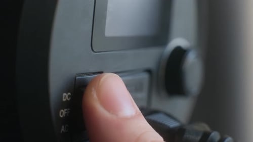 Man Turn Off an LED Video Light