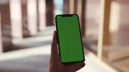 Lviv Ukraine May 19 2018 At Sunlight Young Woman Hands Holding Phone with Horizontal Green Screen on