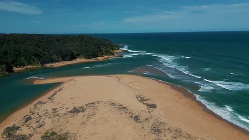 Sandy beach bay sea coast in Queensland, NSW, and Victoria, Australia. Aerial drone seaside slow mot