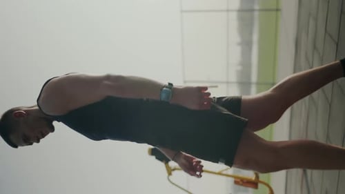 Athletic Man Doing Calisthenics at Outdoor Gym