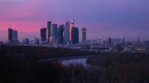 Moscow City time-lapse night view of Moscow, Russia with violet sky.