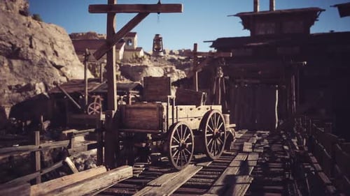 Rustic Wooden Cart Resting on Wooden Planks in an Old Western Mining Town